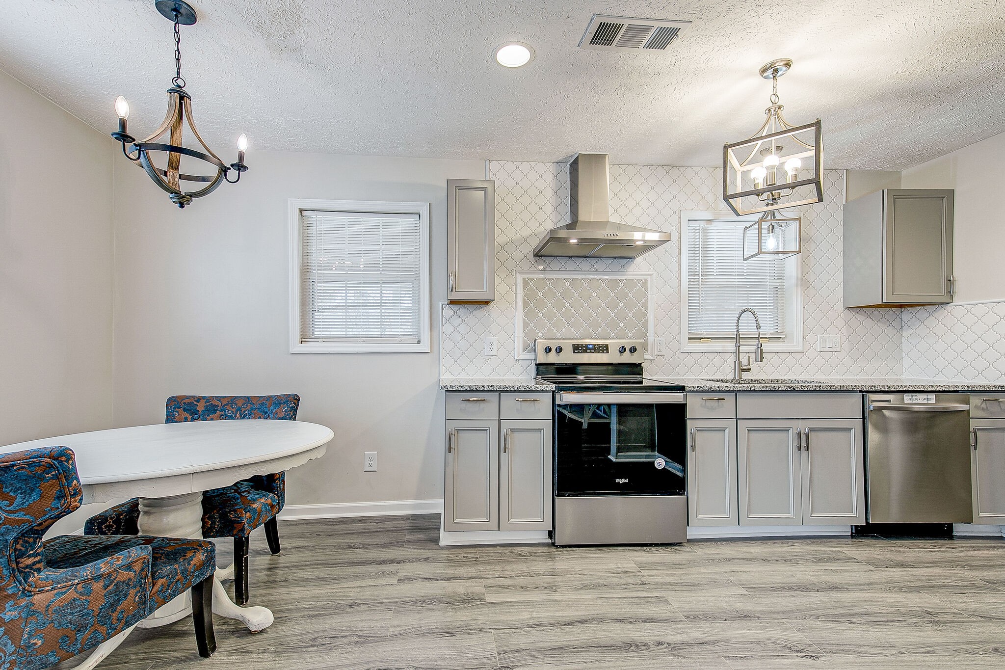 331 Alice Boynton Road Manchester, TN 37355 - Photo 7 of 22 a kitchen with stainless steel appliances a stove a sink and a refrigerator