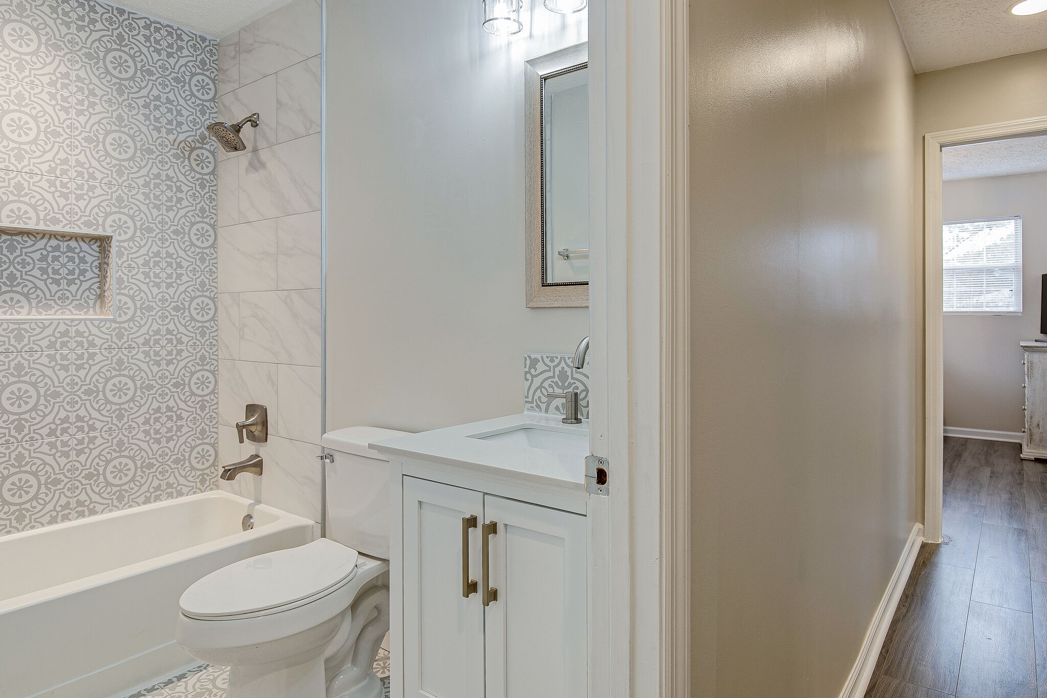 331 Alice Boynton Road Manchester, TN 37355 - Photo 10 of 22 a bathroom with a sink a toilet and shower