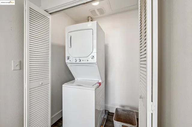 a bathroom with a sink toilet vanity and tub
