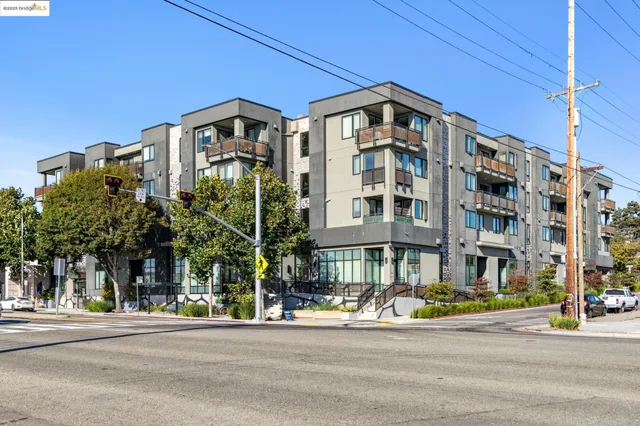 a view of a building with sitting area