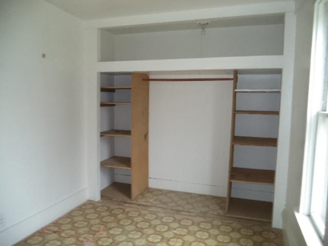 7925 Centerville Road Capron, IL 61012 - Photo 11 of 18 a room that has a bench in it