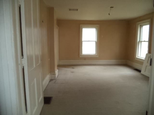7925 Centerville Road Capron, IL 61012 - Photo 6 of 18 an empty room with a empty space and windows