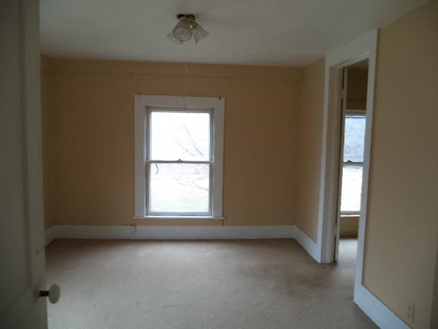 7925 Centerville Road Capron, IL 61012 - Photo 8 of 18 an empty room with a window