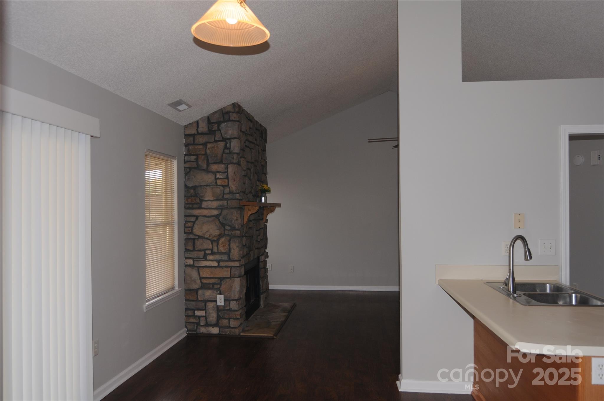 163 Planters Row Road Iron Station, NC 28080 - Photo 17 of 33 a bathroom with a sink and a mirror