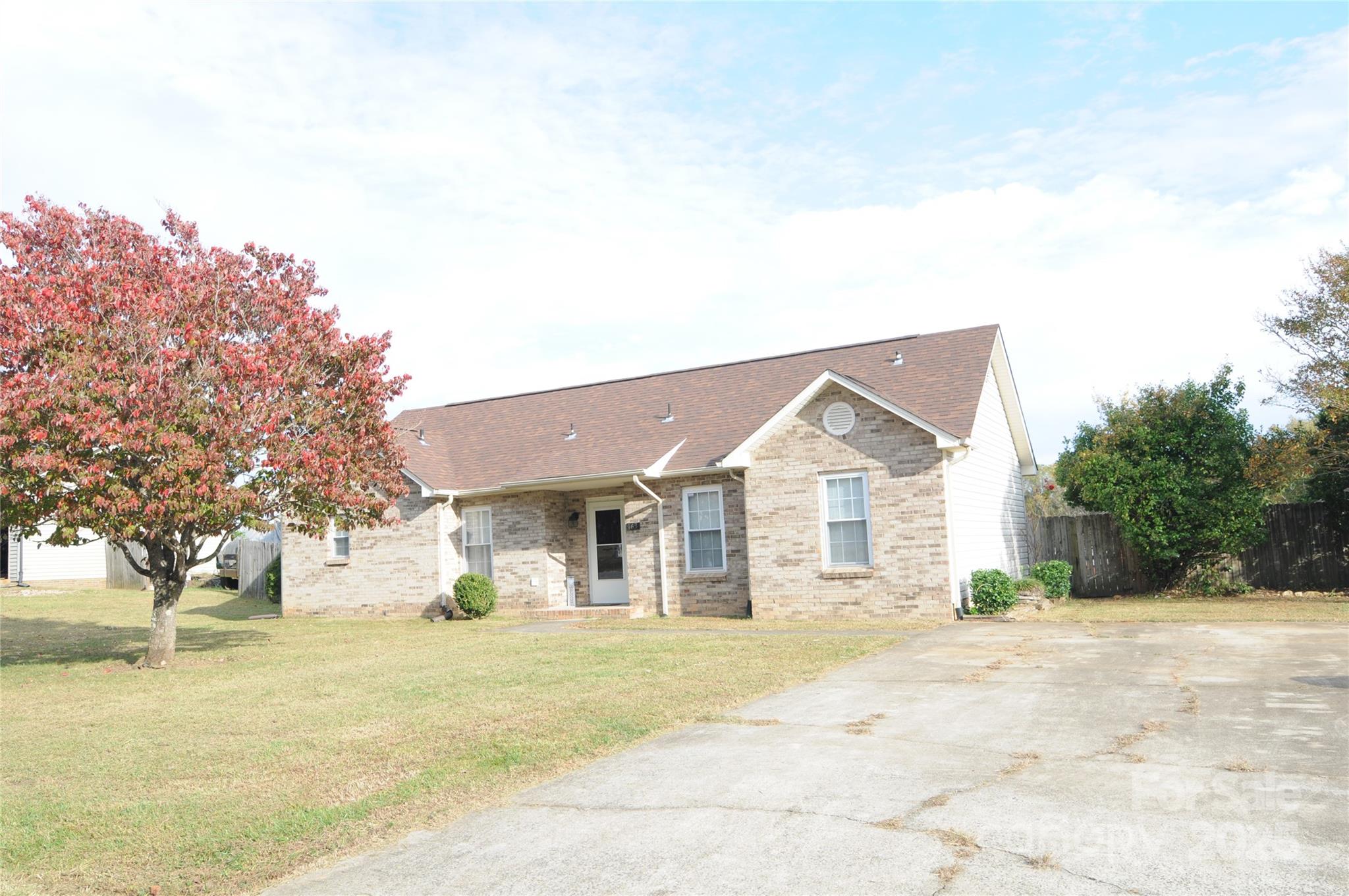163 Planters Row Road Iron Station, NC 28080 - Photo 2 of 33 a front view of a house with a yard