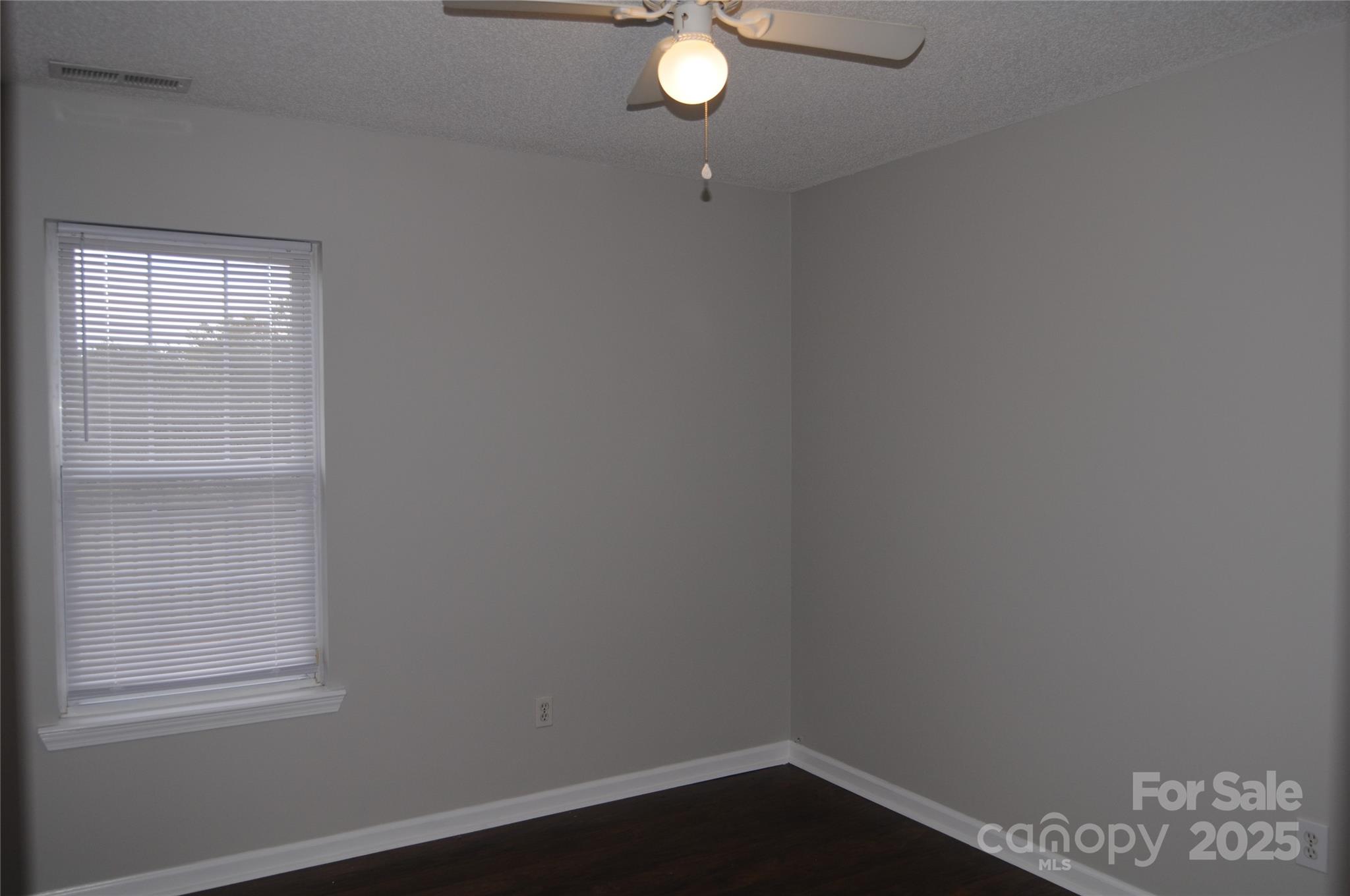 163 Planters Row Road Iron Station, NC 28080 - Photo 22 of 33 an empty room with a window