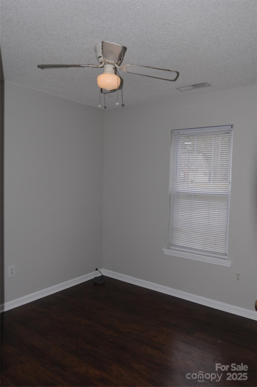 163 Planters Row Road Iron Station, NC 28080 - Photo 23 of 33 a view of a small space with wooden floor and a window