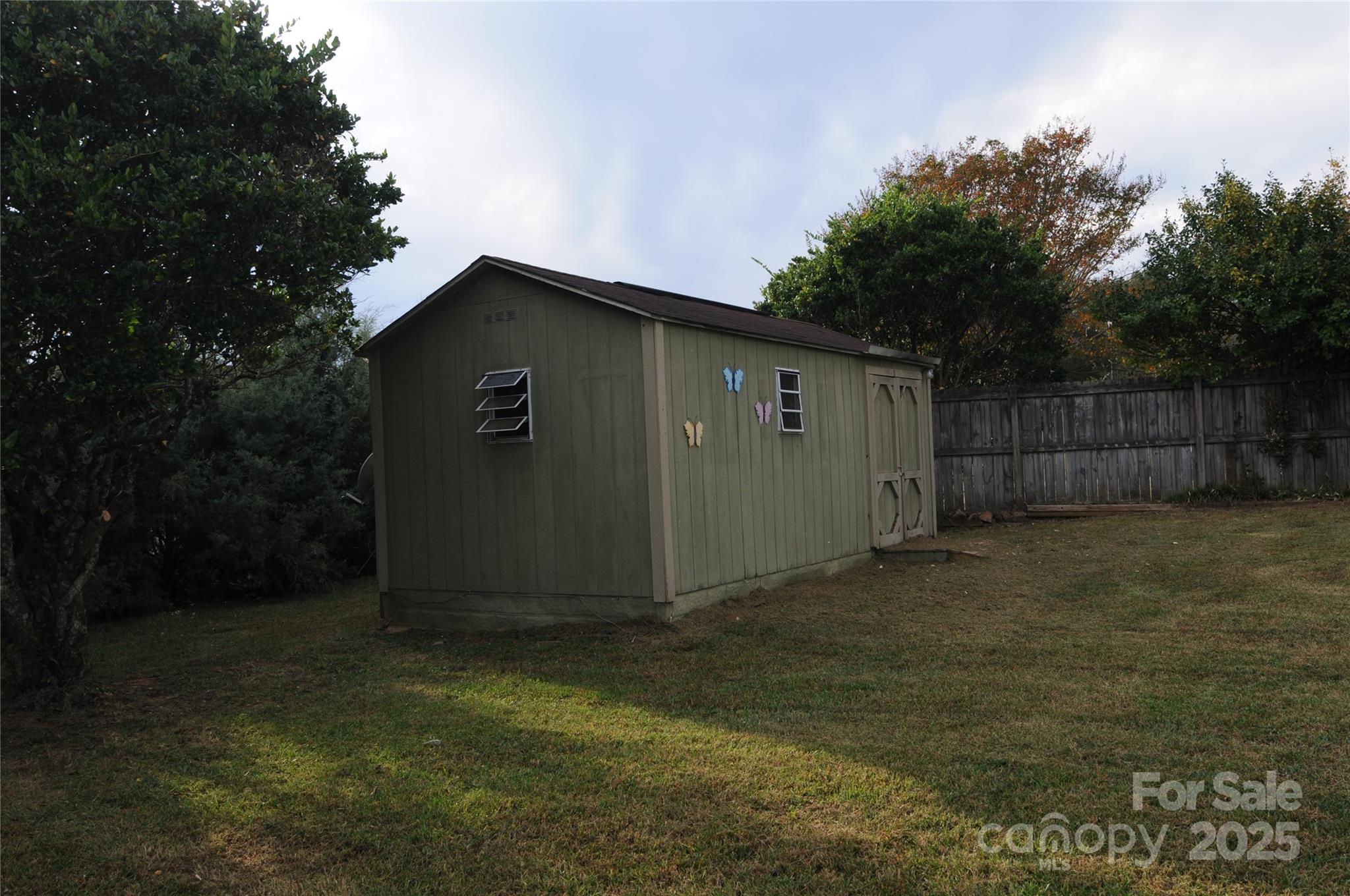 163 Planters Row Road Iron Station, NC 28080 - Photo 26 of 33 a backyard of a house