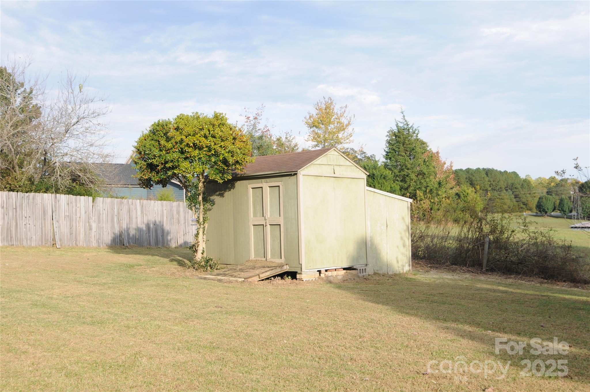 163 Planters Row Road Iron Station, NC 28080 - Photo 29 of 33 a view of a backyard