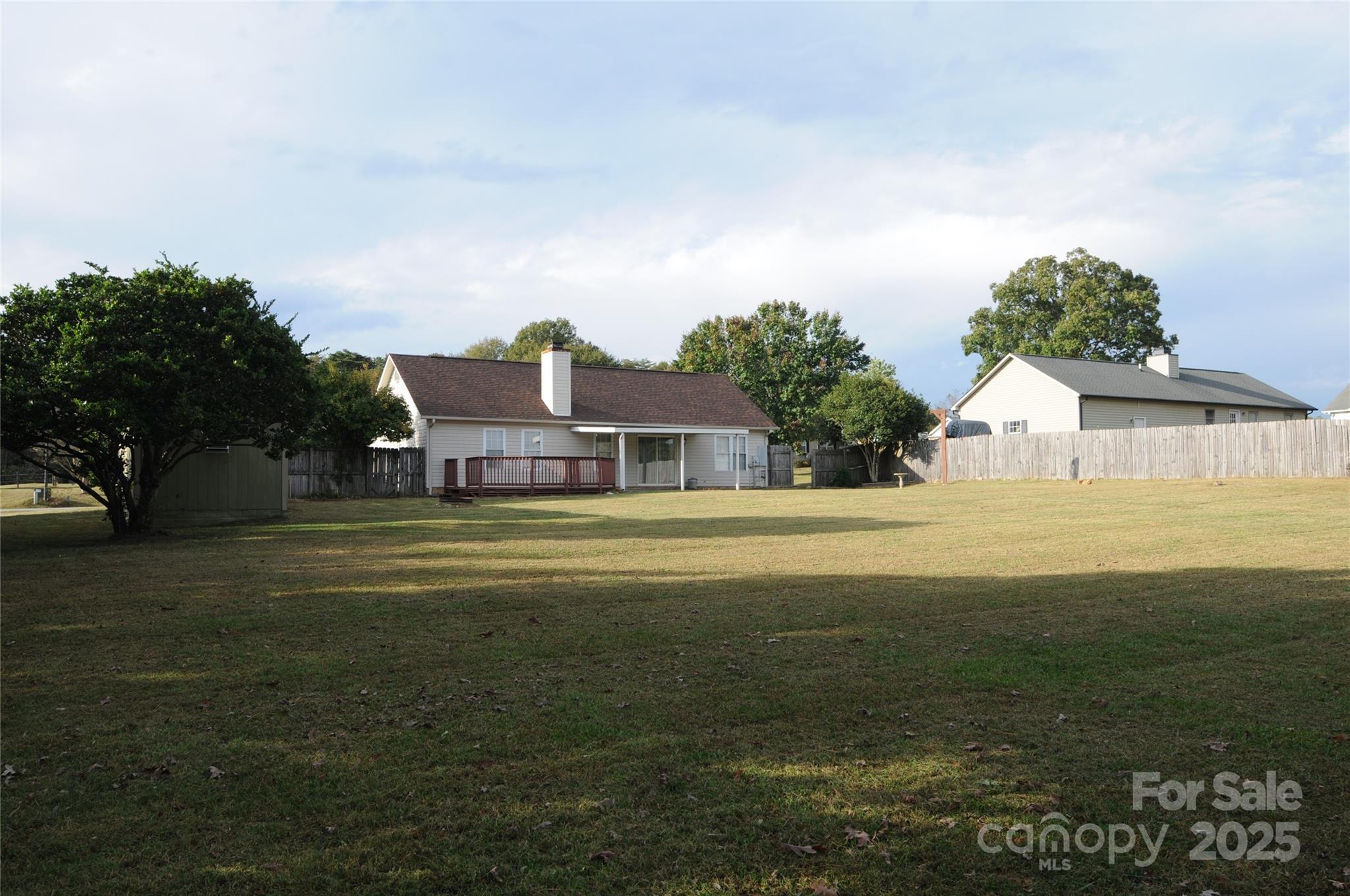 163 Planters Row Road Iron Station, NC 28080 - Photo 32 of 33 a front view of a house with a garden