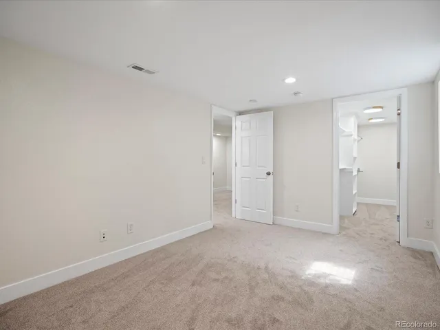 a view of an empty walk in closet