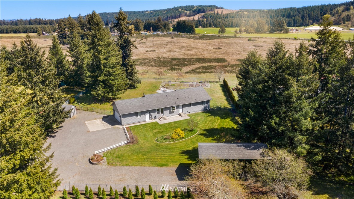 18926 Nutmeg Street Southwest Rochester, WA 98579 - Photo 2 of 23 an aerial view of residential houses with outdoor space