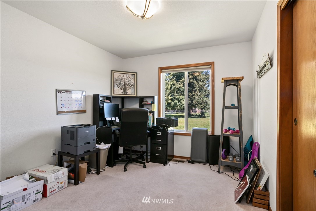 18926 Nutmeg Street Southwest Rochester, WA 98579 - Photo 16 of 23 a view of a workspace with furniture and a window