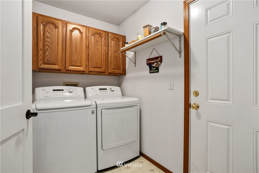 18926 Nutmeg Street Southwest Rochester, WA 98579 - Photo 18 of 23 a utility room with dryer and washer