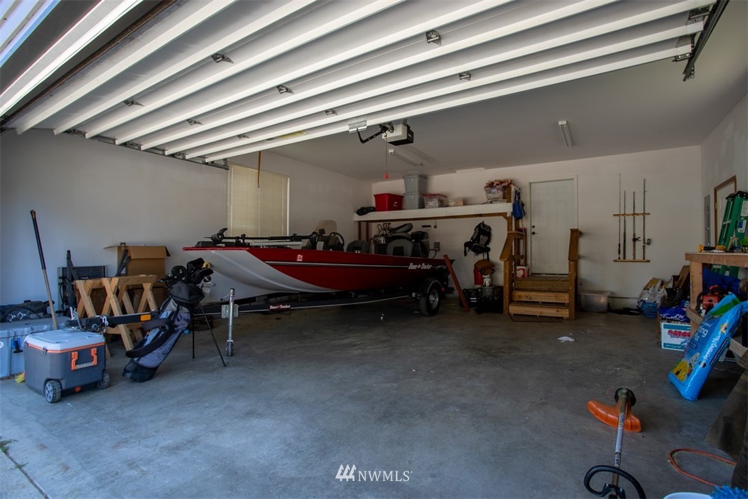 18926 Nutmeg Street Southwest Rochester, WA 98579 - Photo 19 of 23 a storage room with gym equipment