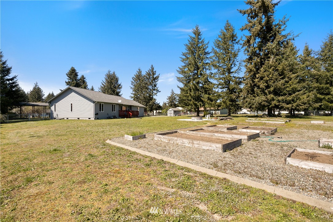 18926 Nutmeg Street Southwest Rochester, WA 98579 - Photo 22 of 23 a view of swimming pool with an outdoor space