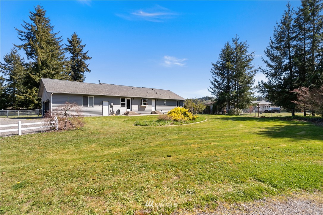 18926 Nutmeg Street Southwest Rochester, WA 98579 - Photo 23 of 23 a view of swimming pool with outdoor seating and yard