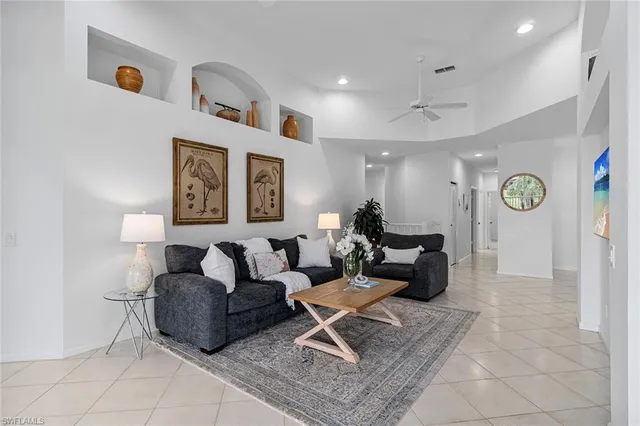 a living room with furniture and a table