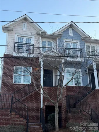 a front view of a house with a porch