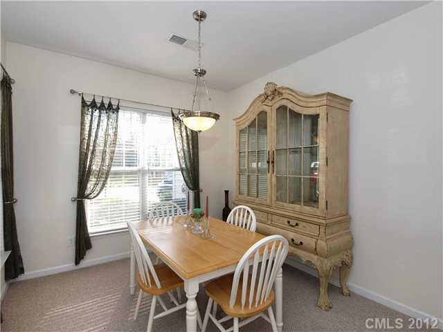 150 Whitley Mills Road Fort Mill, SC 29708 - Photo 2 of 16 a view of a dining room with furniture window and outside view