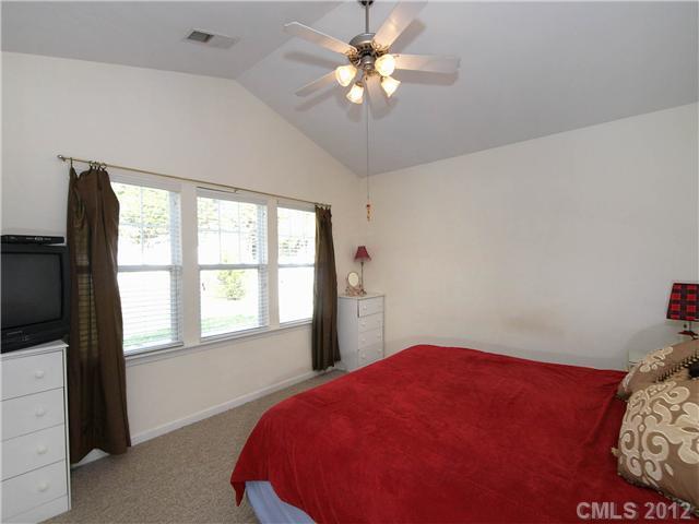 150 Whitley Mills Road Fort Mill, SC 29708 - Photo 7 of 16 a bedroom with a bed dresser and a window