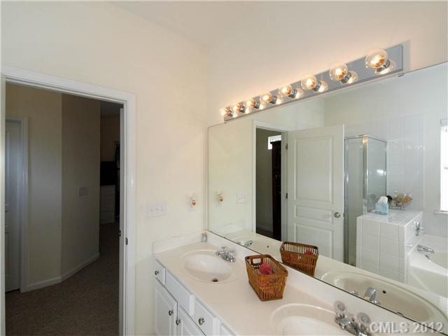 150 Whitley Mills Road Fort Mill, SC 29708 - Photo 9 of 16 a bathroom with a sink and a mirror