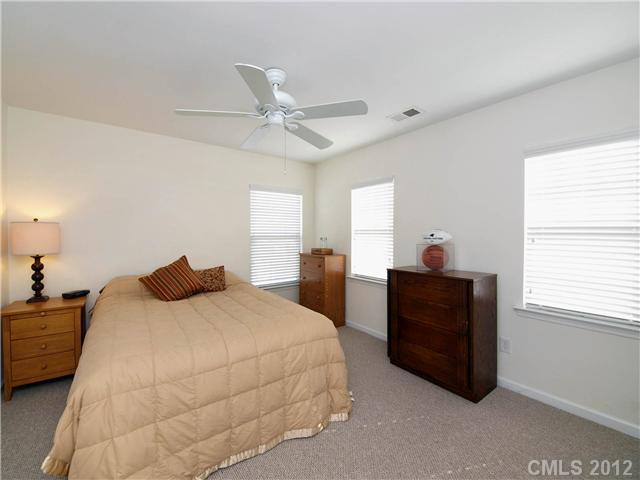 150 Whitley Mills Road Fort Mill, SC 29708 - Photo 10 of 16 a bedroom with a bed and window