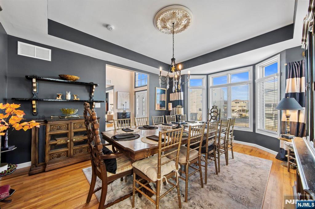 19 Maryland Road Little Egg Harbor, NJ 08087 - Photo 14 of 48 a view of a dining room with furniture window and wooden floor