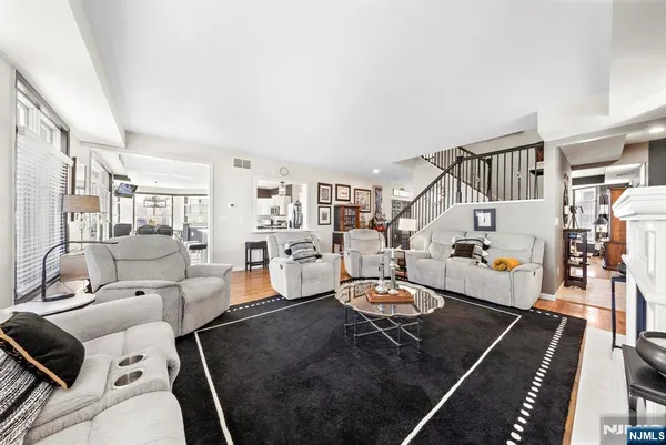 a living room with furniture and a view of living room