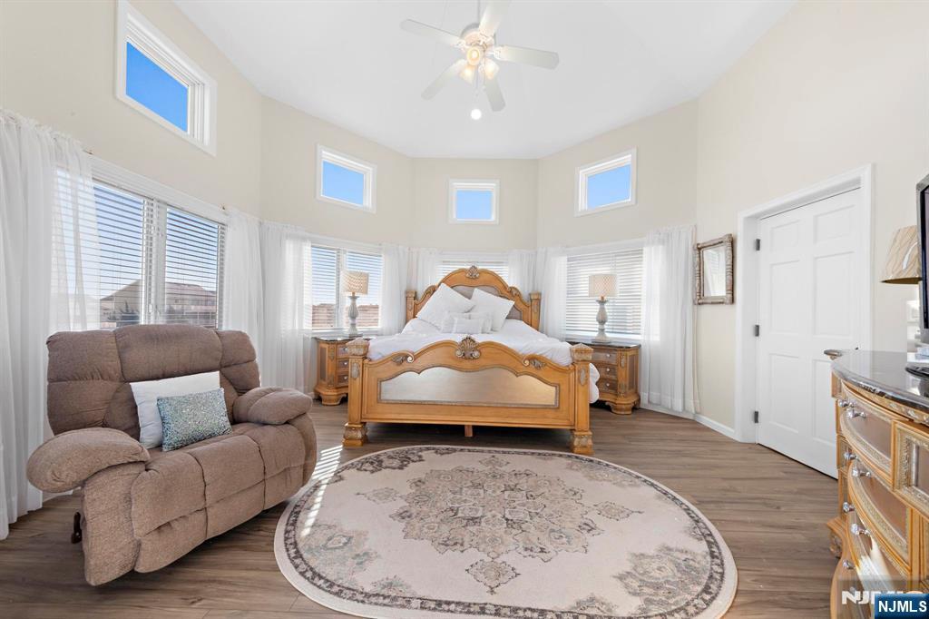 19 Maryland Road Little Egg Harbor, NJ 08087 - Photo 35 of 48 a living room with furniture and a wooden floor