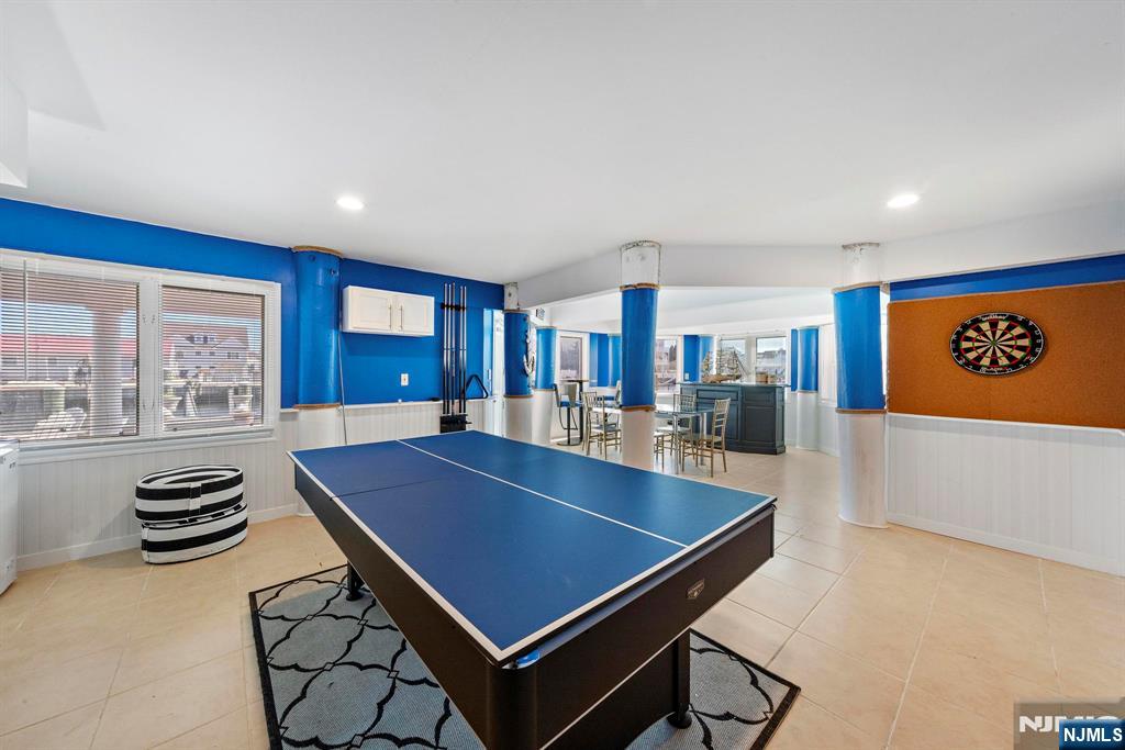 19 Maryland Road Little Egg Harbor, NJ 08087 - Photo 39 of 48 a room with furniture pool table and windows