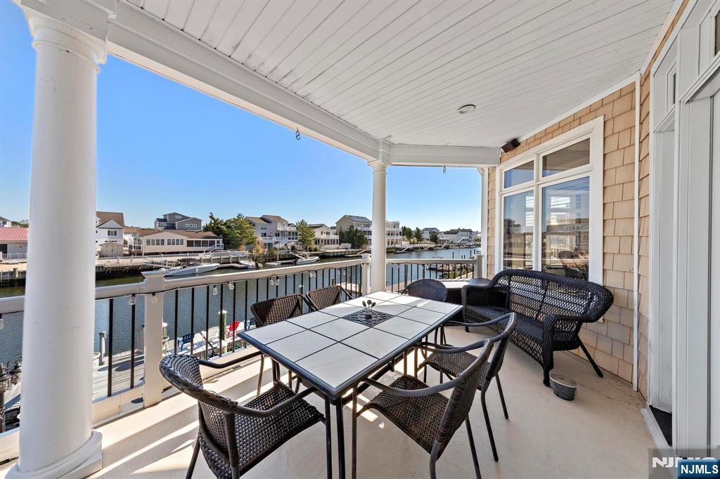 19 Maryland Road Little Egg Harbor, NJ 08087 - Photo 43 of 48 a view of a terrace with furniture and outside view