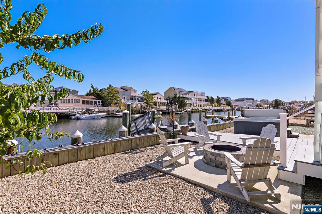 19 Maryland Road Little Egg Harbor, NJ 08087 - Photo 46 of 48 a view of swimming pool with outdoor seating and city view