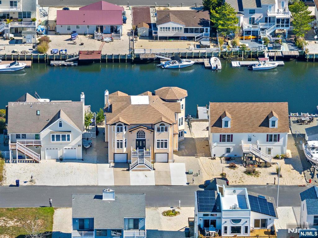 19 Maryland Road Little Egg Harbor, NJ 08087 - Photo 6 of 48 an aerial view of residential houses with outdoor space and lake view