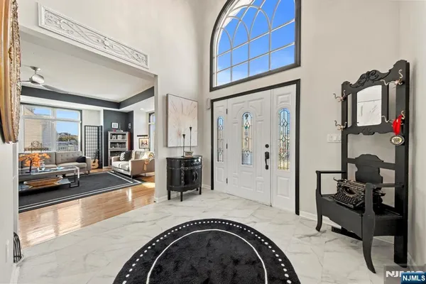 a view of a livingroom with furniture and windows