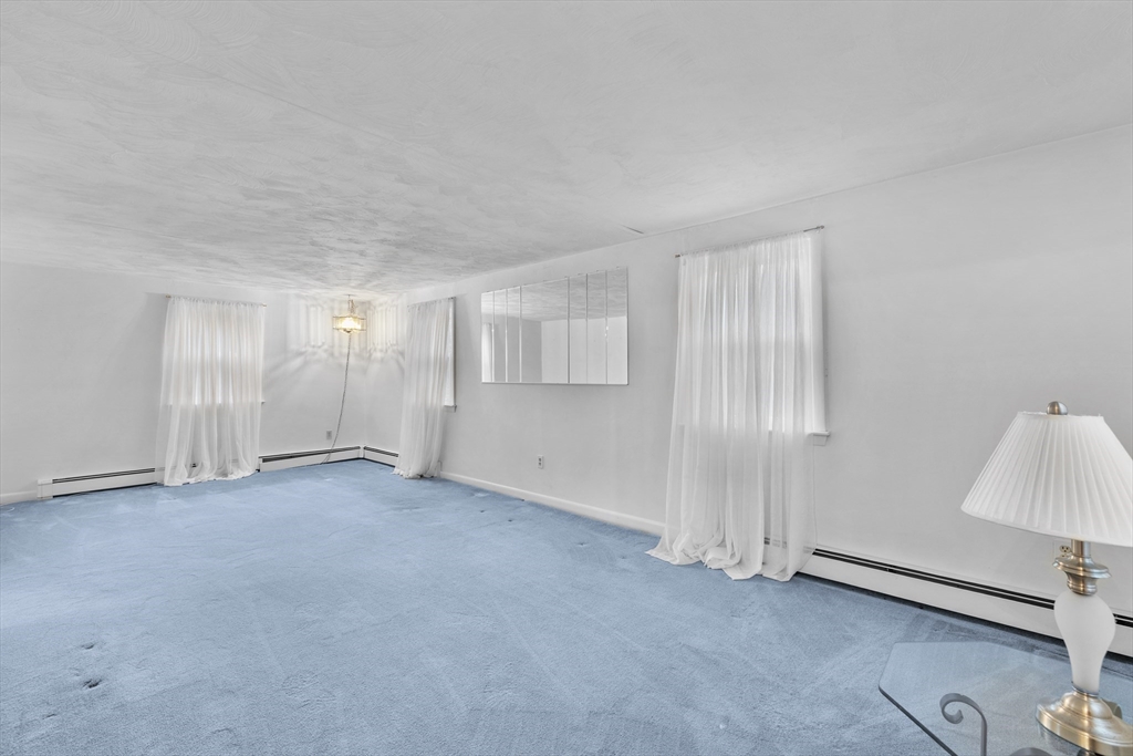 58 Lakeview Road Foxboro, MA 02035 - Photo 20 of 42 an empty room with a empty space and a window