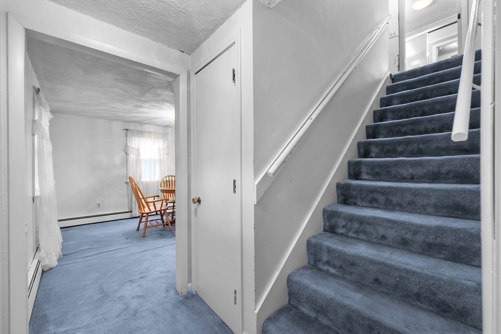 58 Lakeview Road Foxboro, MA 02035 - Photo 22 of 42 a view of entryway and hall with wooden floor