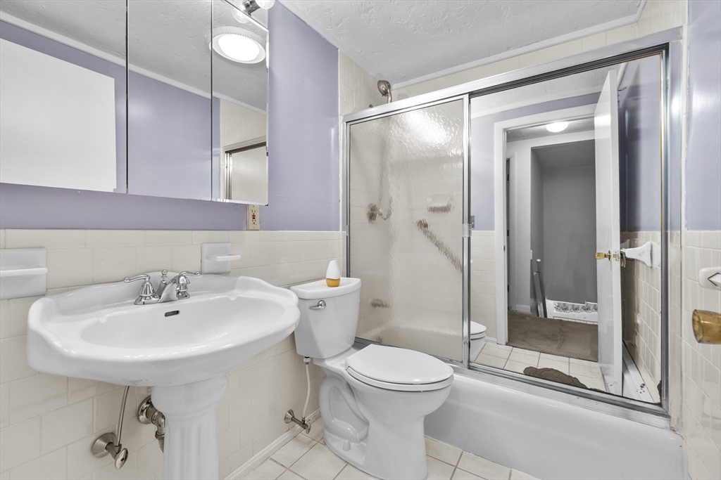 58 Lakeview Road Foxboro, MA 02035 - Photo 26 of 42 a bathroom with a sink toilet and shower