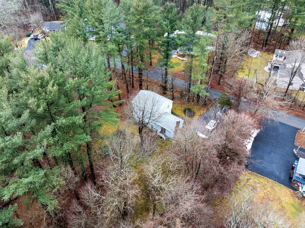 58 Lakeview Road Foxboro, MA 02035 - Photo 5 of 42 a backyard of a house with outdoor seating