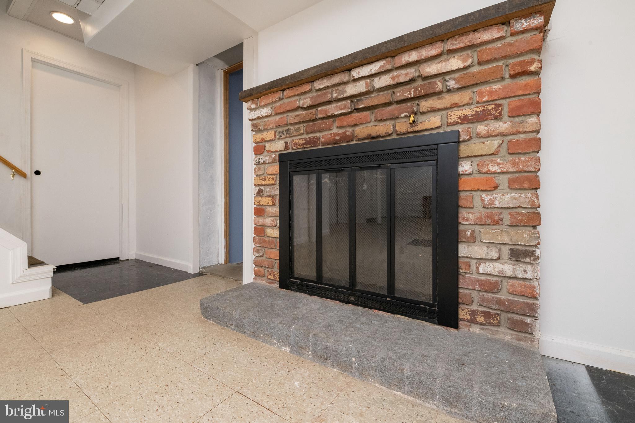 2313 Jerrys Road Street, MD 21154 - Photo 21 of 32 Lower level fireplace