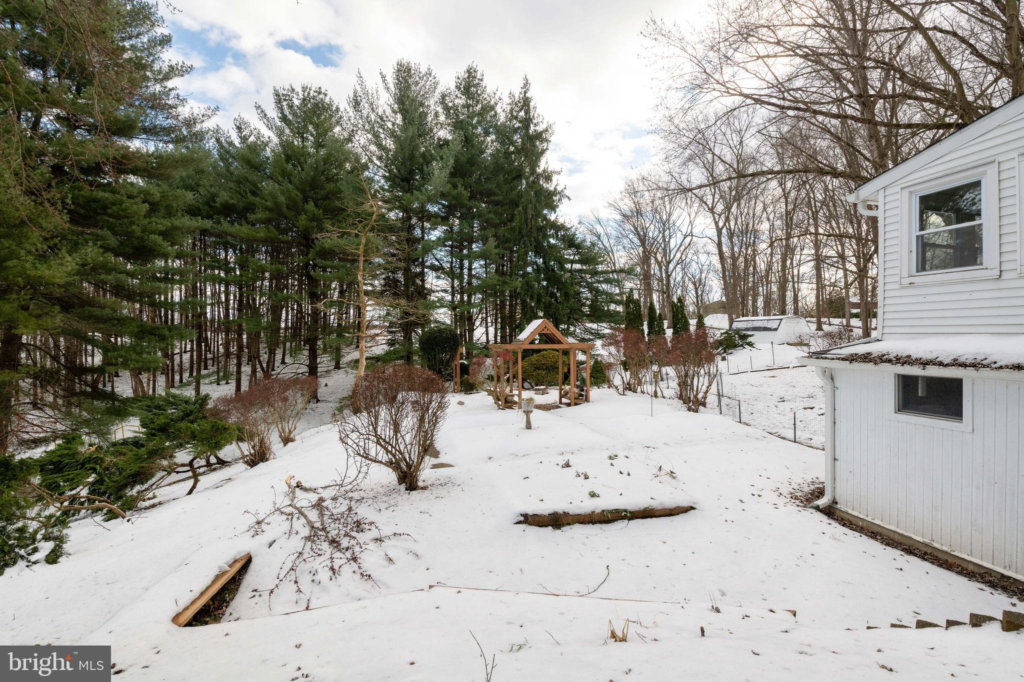 2313 Jerrys Road Street, MD 21154 - Photo 27 of 32 Snow covered vegetable gardens.