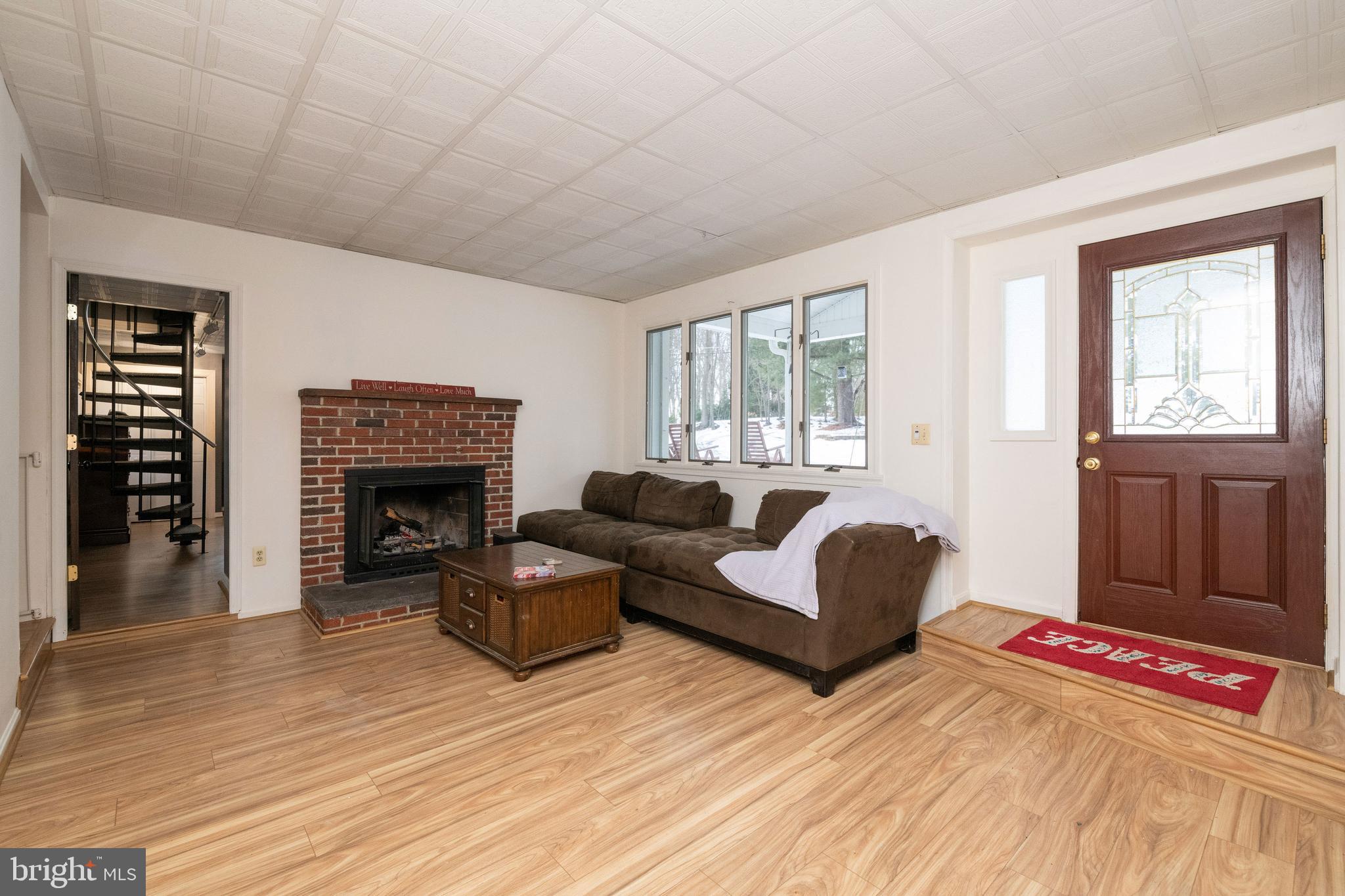 2313 Jerrys Road Street, MD 21154 - Photo 4 of 32 Living room with wood burning fireplace.