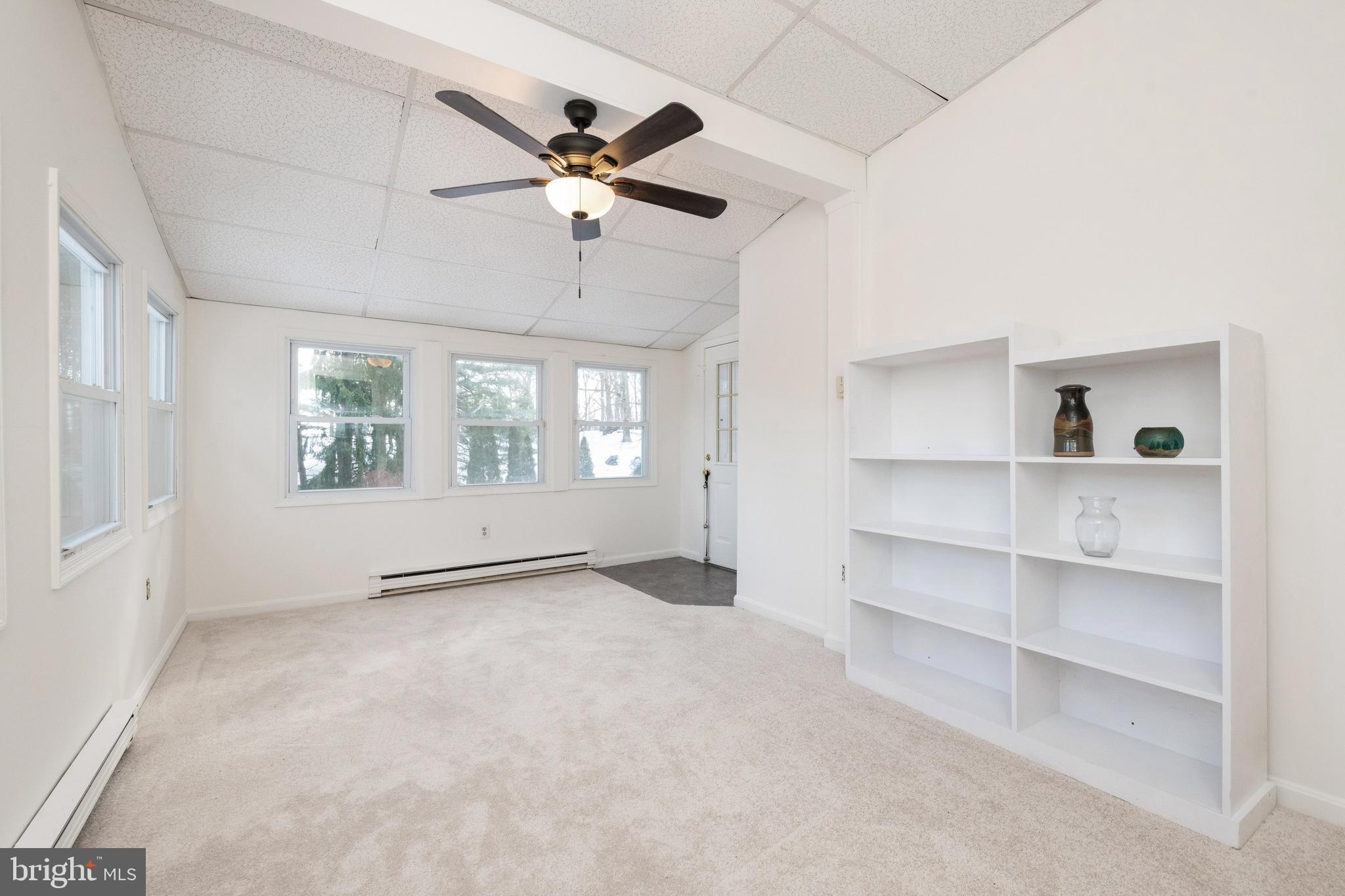 2313 Jerrys Road Street, MD 21154 - Photo 10 of 32 Sunroom with beautiful views and natural lighting.