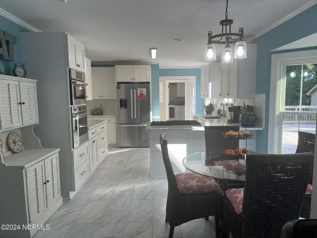 $830,000 | 444 Creekview Drive East, Hampstead, NC 28443