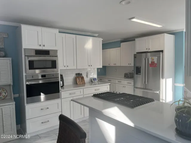 $830,000 | 444 Creekview Drive East, Hampstead, NC 28443