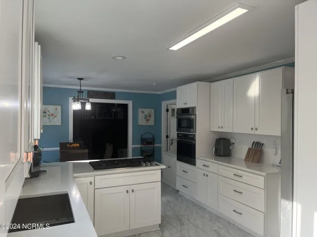 $830,000 | 444 Creekview Drive East, Hampstead, NC 28443