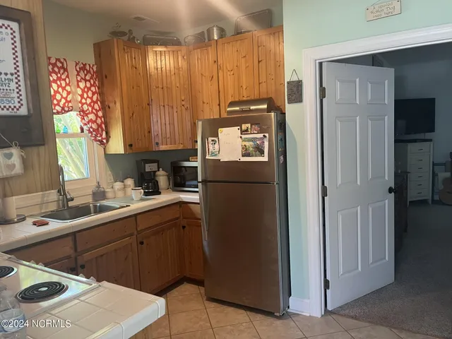 $830,000 | 444 Creekview Drive East, Hampstead, NC 28443