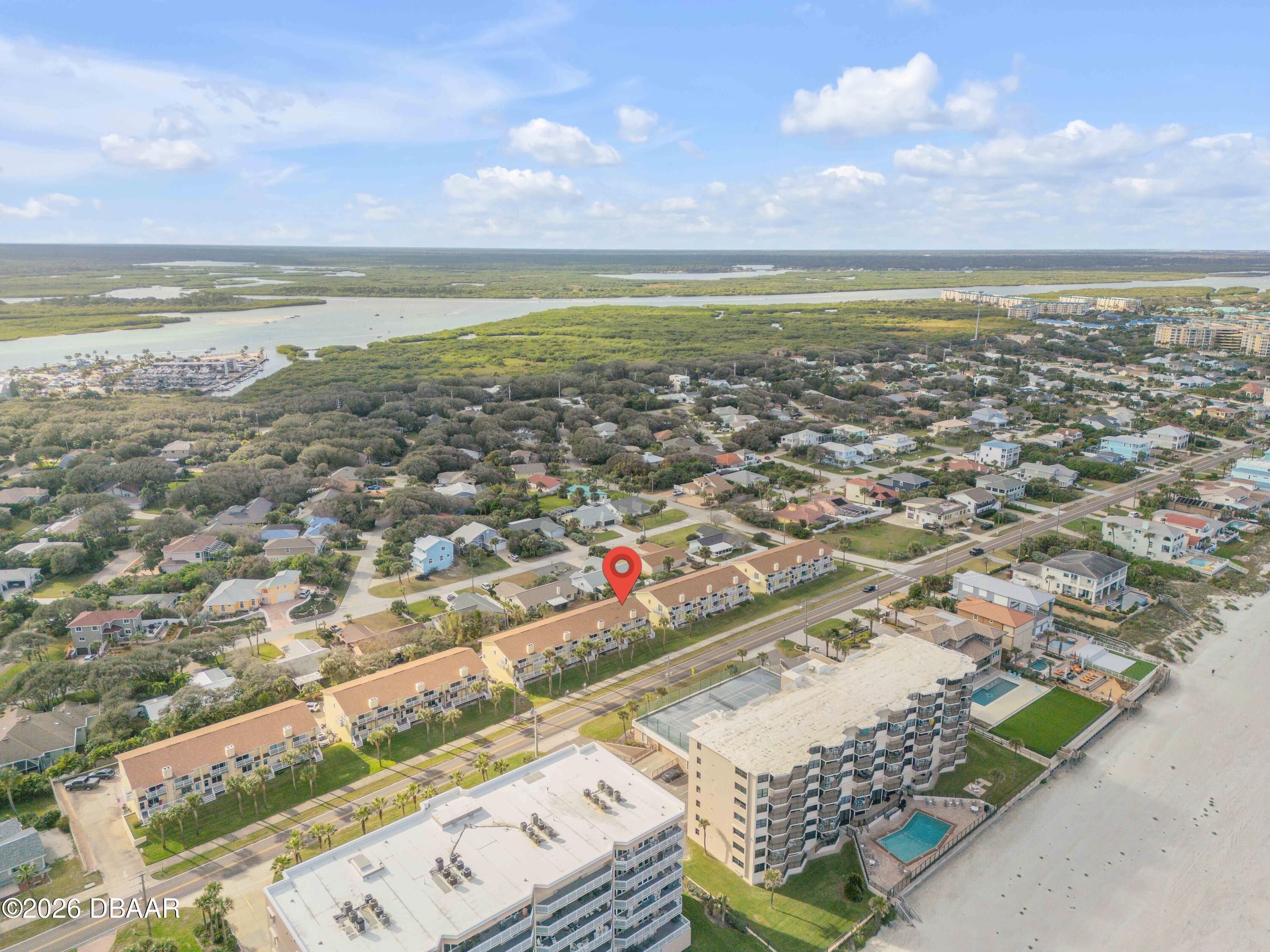 4752 South Atlantic Avenue, Unit 1 Ponce Inlet, FL 32127 - Photo 39 of 49 an aerial view of residential building and ocean