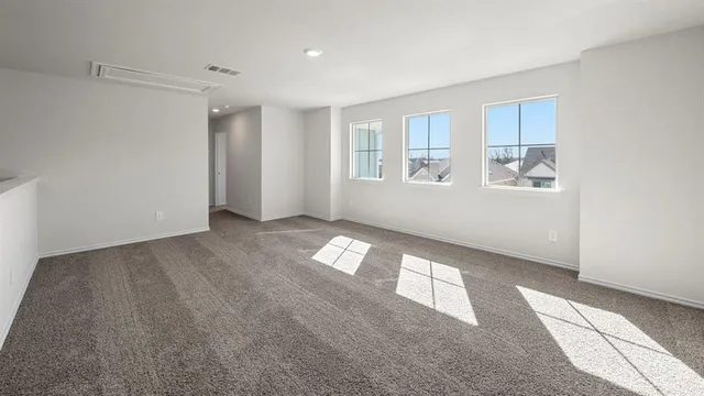 a kitchen with a sink and a stove top oven