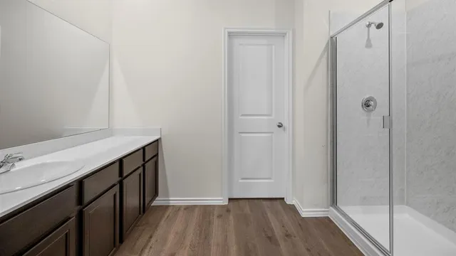 a bathroom with a sink and a mirror